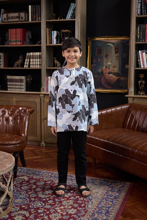 The Warisan Raya Boy Teluk Belanga Bunga Raya Print