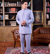 men looking down posing for the camera wearing baju melayu set stone blue