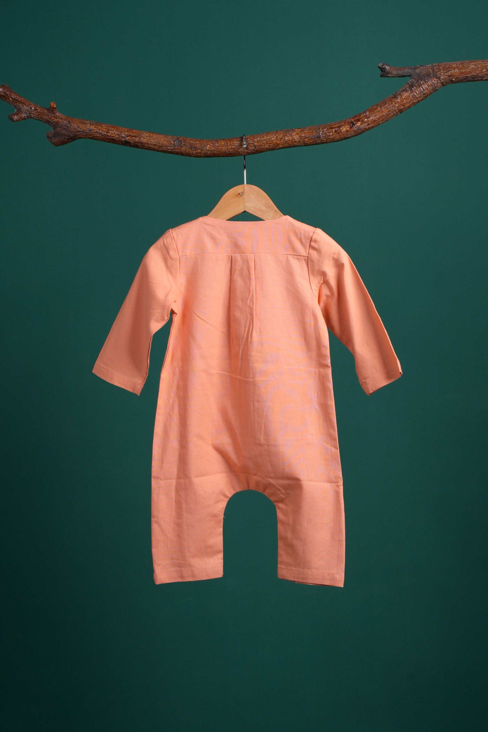 The Rimba Raya Baby Jumpsuit Salmon