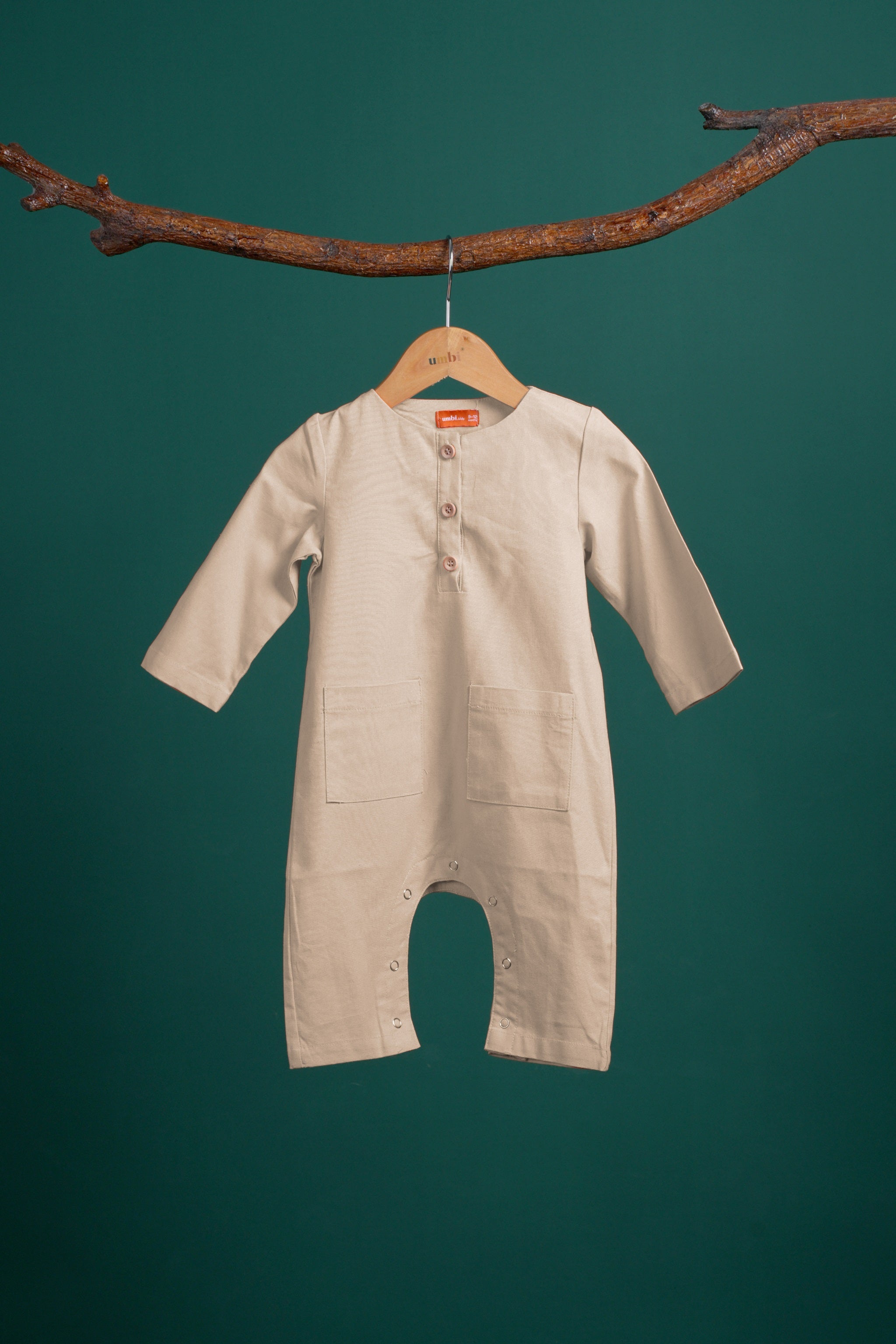 The Rimba Raya Baby Jumpsuit Sand