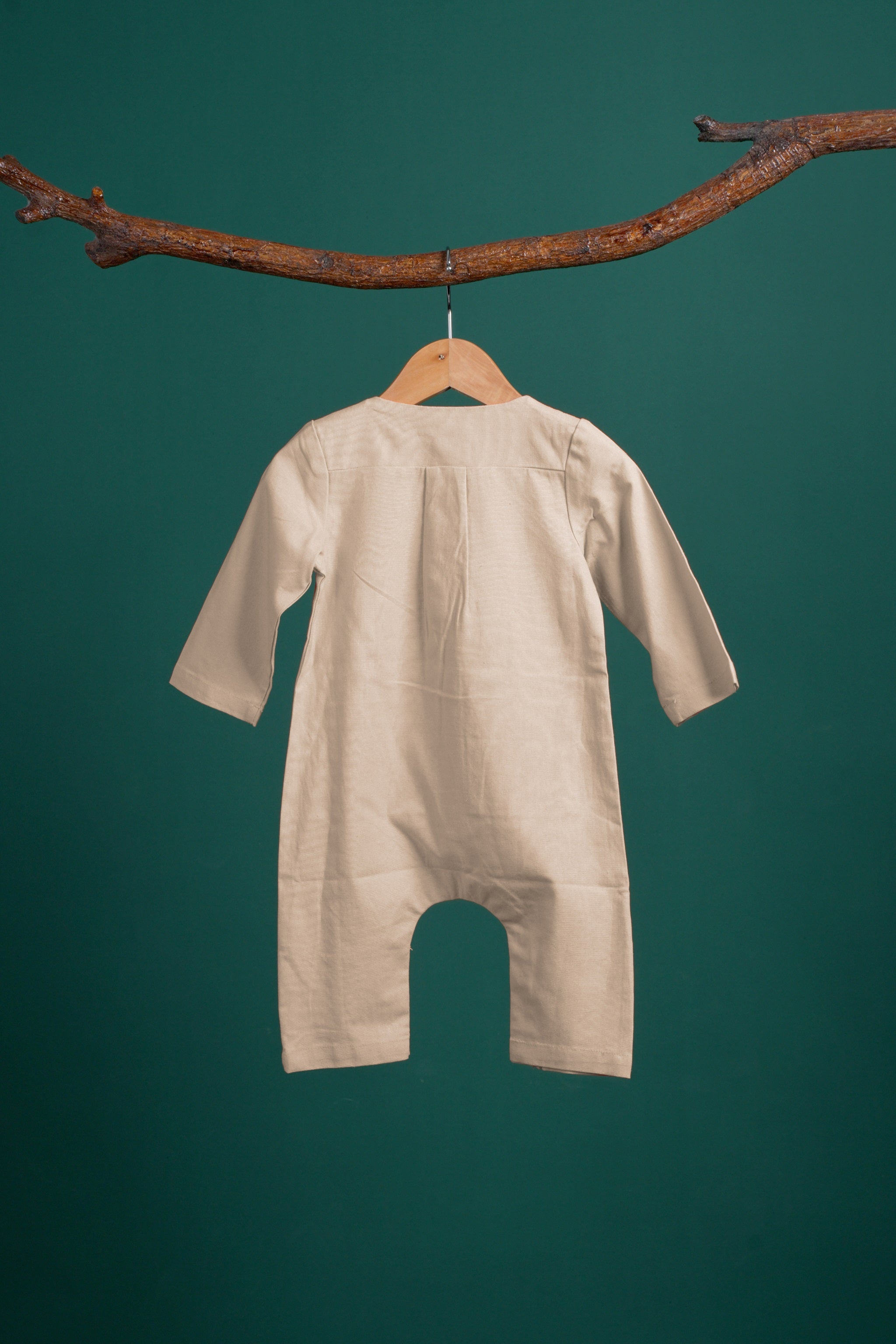 The Rimba Raya Baby Jumpsuit Sand