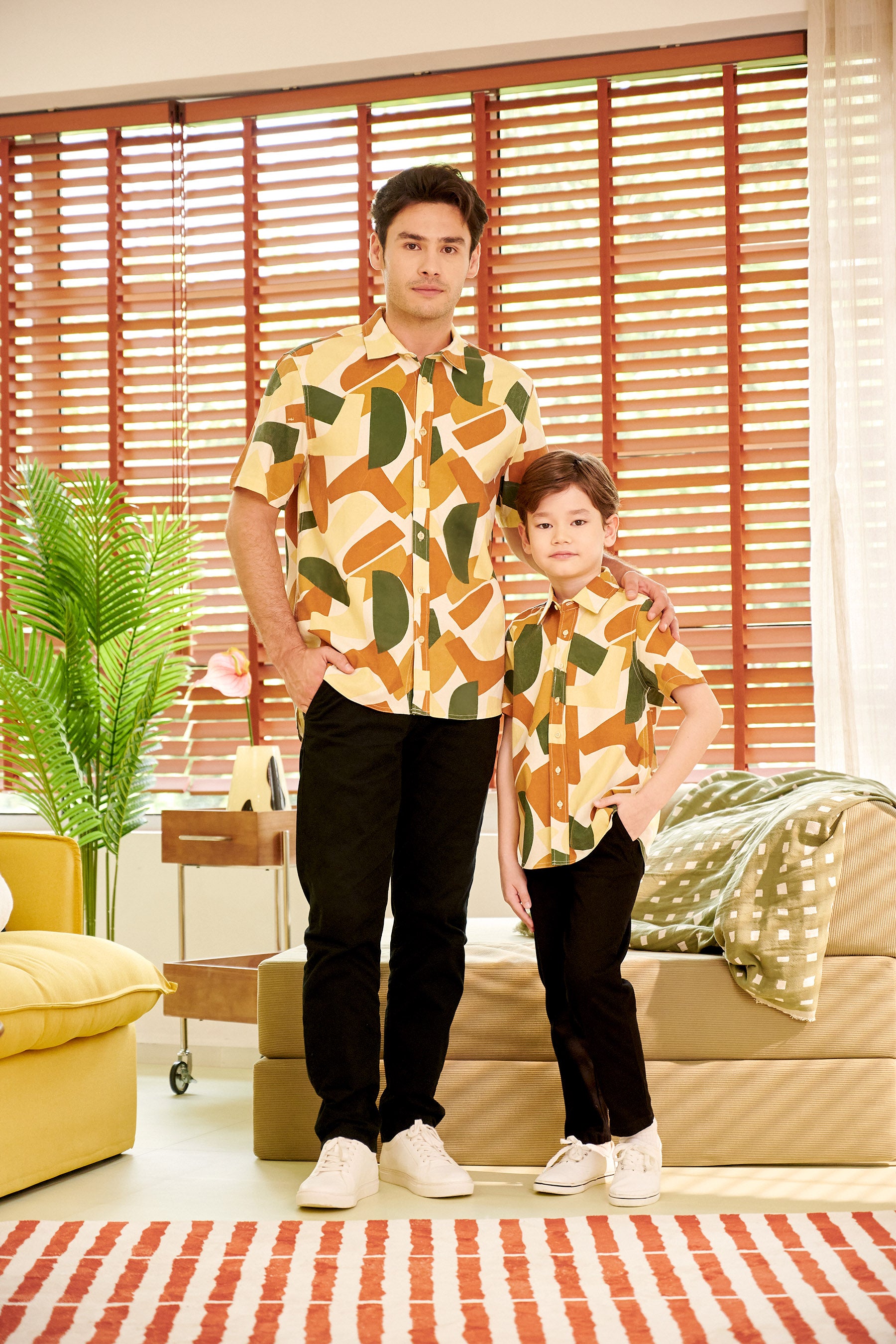 young boy and man standing with one hand in pocket wearing nasi lemak print (retro effect) short-sleeve button collar shirt