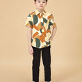 boy standing with one hand in pocket wearing short-sleeve collar shirt nasi lemak print (retro effect)