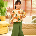 adorable little girl posing in classic skirt pine green