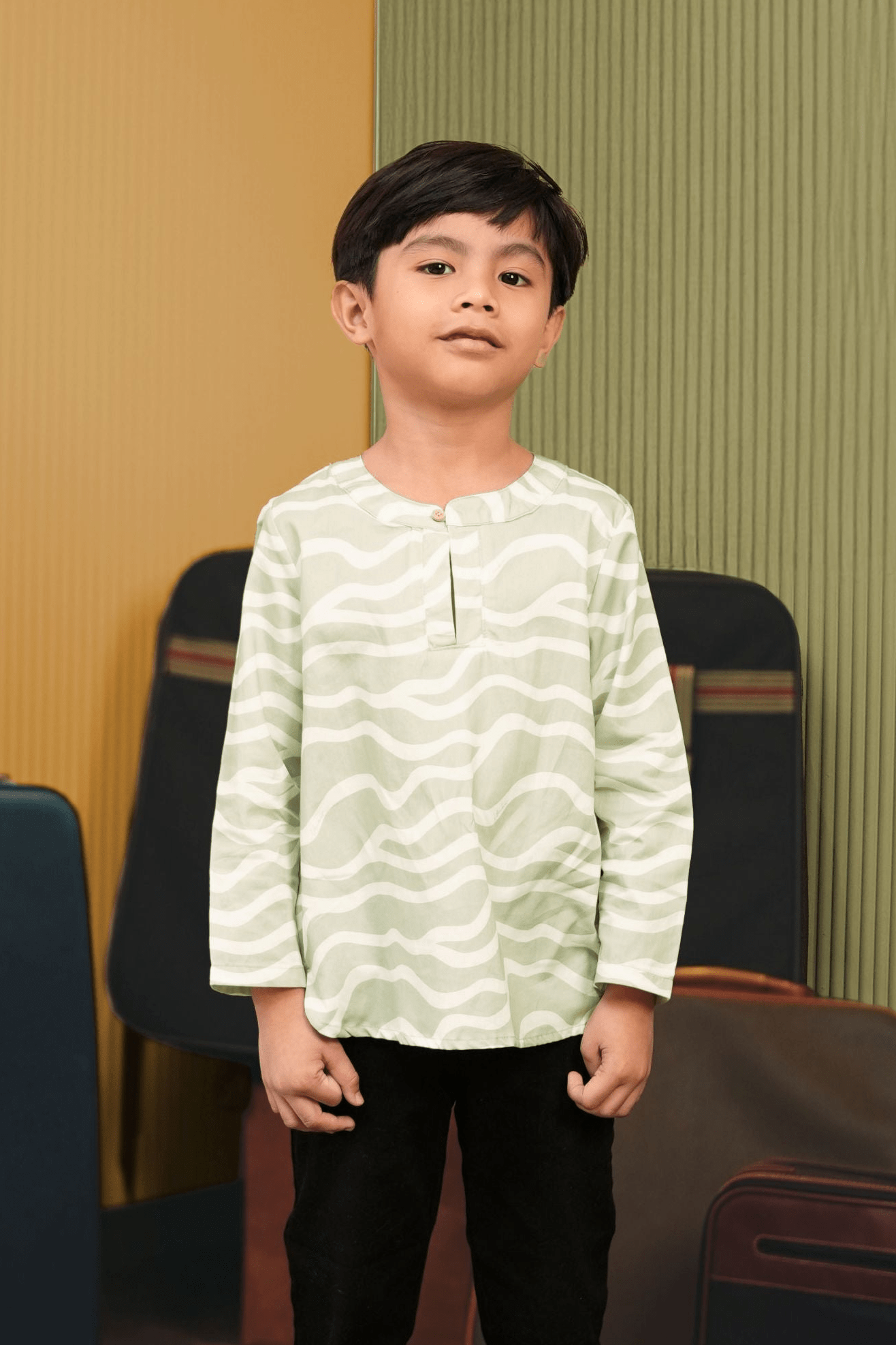 The Early Check - in Collection Boy Teluk Belanga in Meadow Print - Umbi