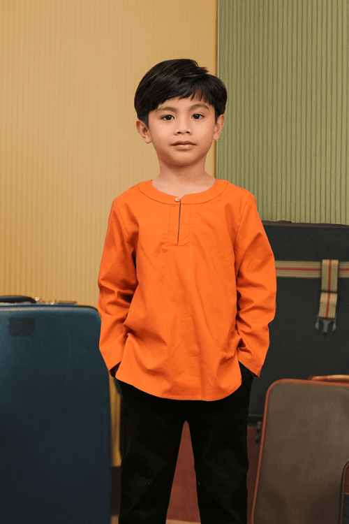 The Early Check-in Collection Boy Teluk Belanga in Orange