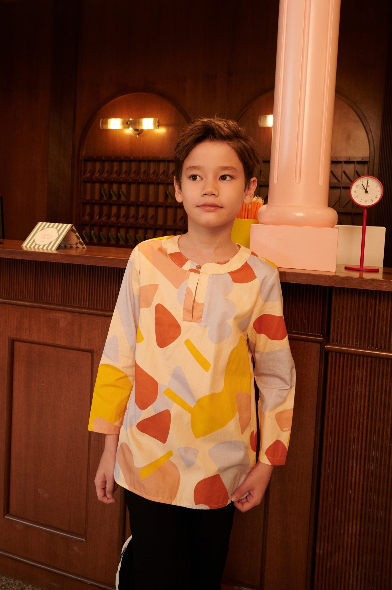 The Early Check - in Collection Boy Teluk Belanga in Playroom Print - Umbi