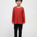 The Early Check - in Collection Boy Teluk Belanga in Terracotta - Umbi