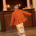 The Early Check - in Collection Girl Ruffles Top in Orange - Umbi