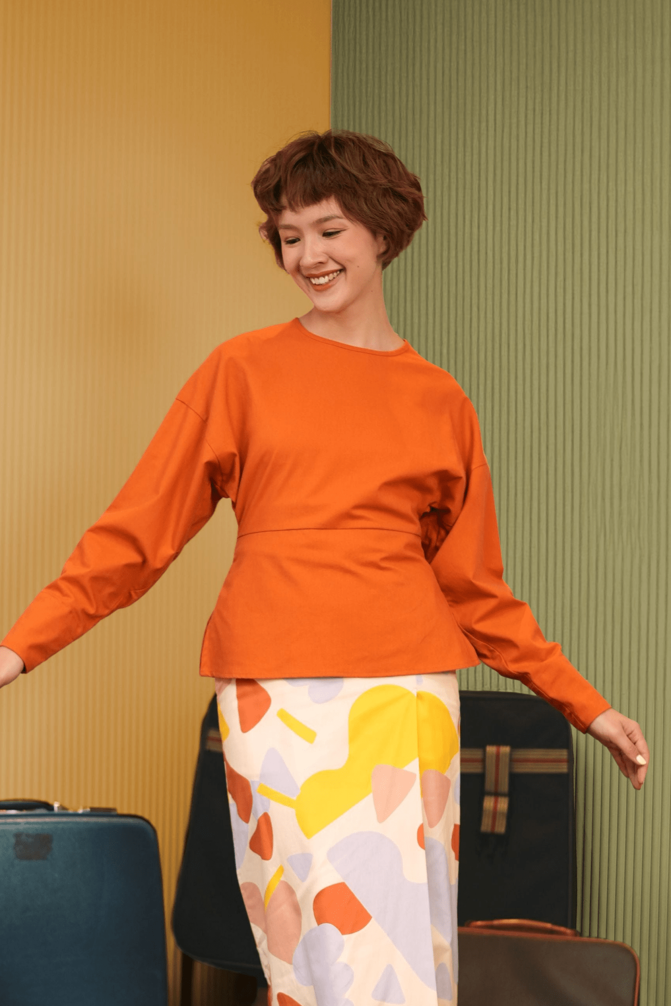 The Early Check - in Collection Women Long Sleeve Fitted Waist Blouse in Orange - Umbi