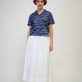 The Early Check - in Collection Women Pleated Flare Skirt in White - Umbi