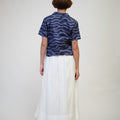 The Early Check - in Collection Women Pleated Flare Skirt in White - Umbi