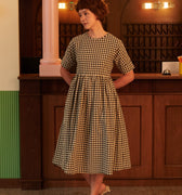 The Early Check - in Collection Women Short Sleeve Midi Flare Dress in Checked Black - Umbi