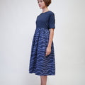 The Early Check - in Collection Women Short Sleeve Midi Flare Dress in Midnight Blue - Umbi