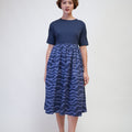 The Early Check - in Collection Women Short Sleeve Midi Flare Dress in Midnight Blue - Umbi