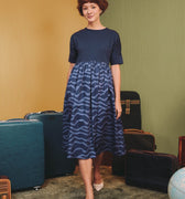 The Early Check - in Collection Women Short Sleeve Midi Flare Dress in Midnight Blue - Umbi