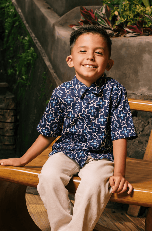 The Embun Collection Boy Holiday Shirt in Blue Gemilang Print