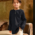 close shot of boy posing in checked black boy long sleeve kurta