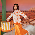 girl posing in column skirt with back pleats orange