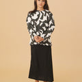 girl standing posing in kurung top scallop embroidery shadow print