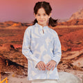 close shot of girl in mirage print mandarin collar kurung