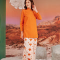 woman gazing to right, posing in desert print classic skirt with scallop embroidery