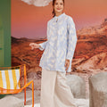 woman posing in mandarin collar kurung top mirage print