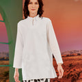 woman close shot in white mandarin collar kurung top