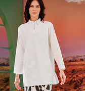 woman close shot in white mandarin collar kurung top