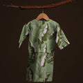 back view of baby kurung dress estate print lookbook