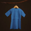 back view of baby kurung dress steel blue lookbook