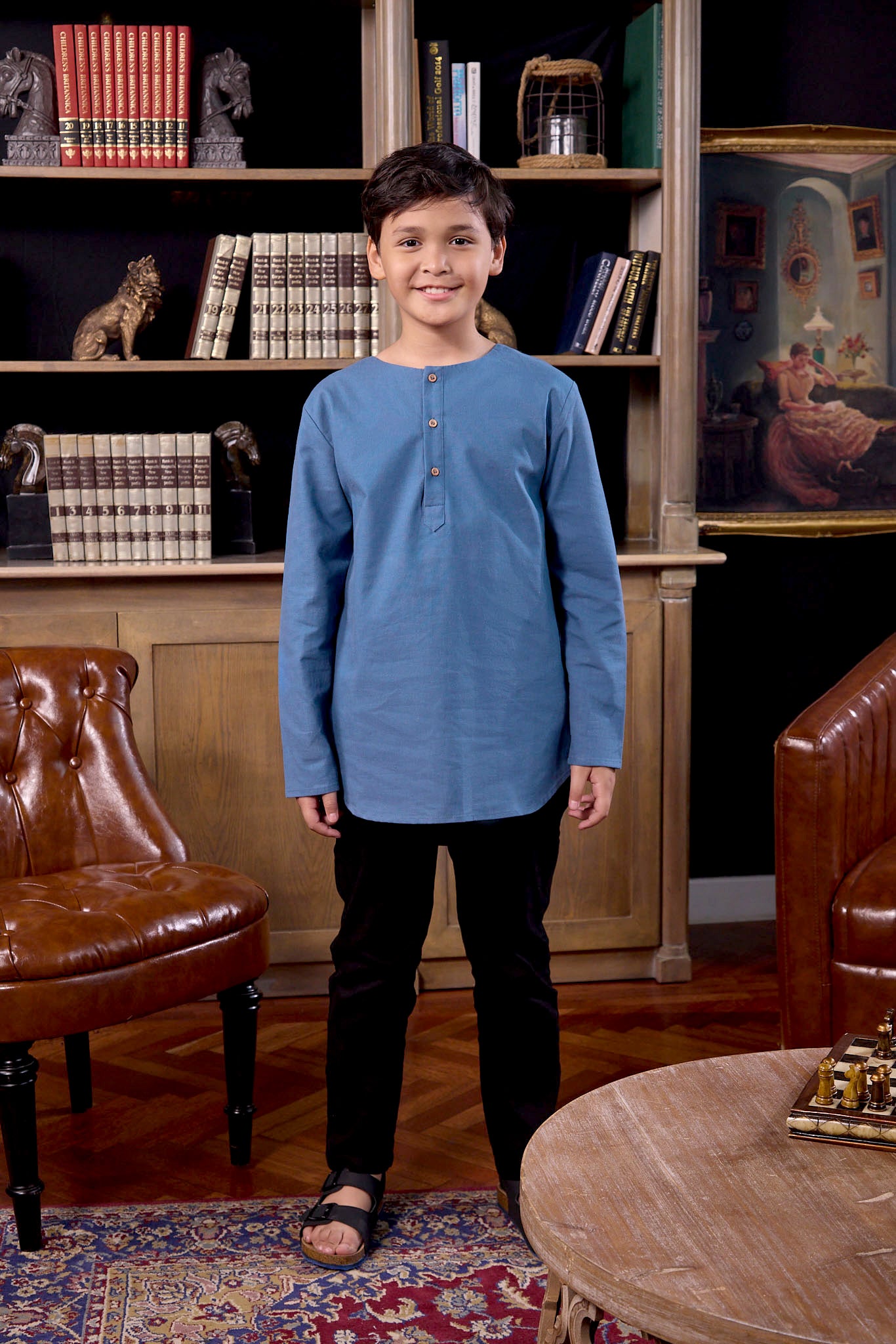 smiling boy standing posing in steel blue boy kurta top