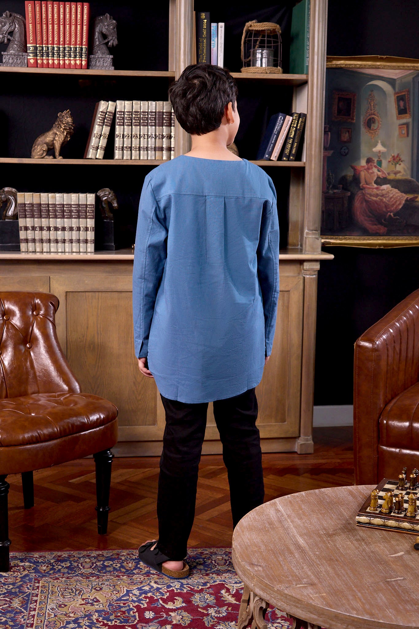 boy posing backwards wearing boy kurta top steel blue