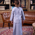 little girl posing backwards wearing stone blue girl classic skirt