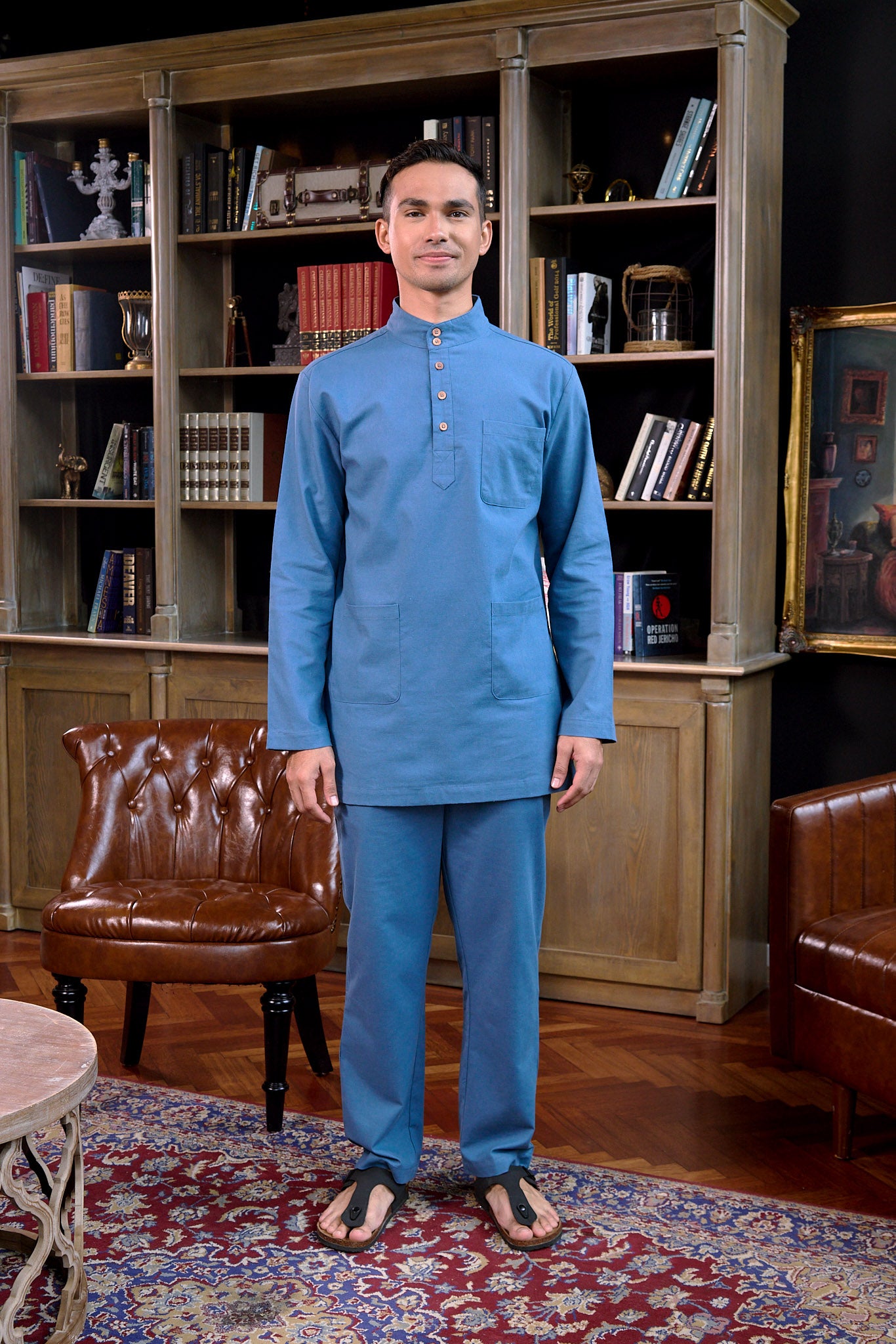 men standing pose wearing baju melayu set steel blue
