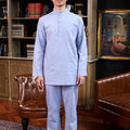 men standing pose wearing stone blue baju melayu set