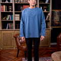 man in kurta steel blue top stands pose confidently