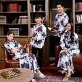 family matching together in warisan raya bunga raya print clothes