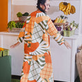 Baju Raya Umbi 2023 women boxy blouse printed sunflower at the market