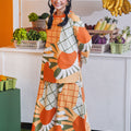 Baju Raya Umbi women boxy blouse printed sunflower at the market
